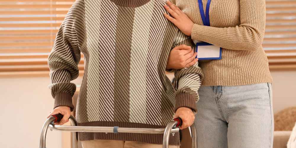 Professional home care supporting an older adult after hospital discharge